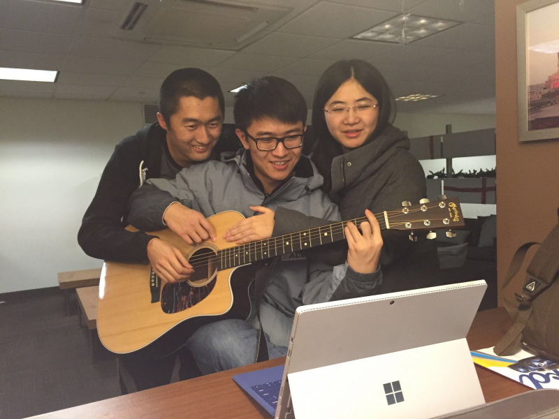 Playing guitar together, Yale